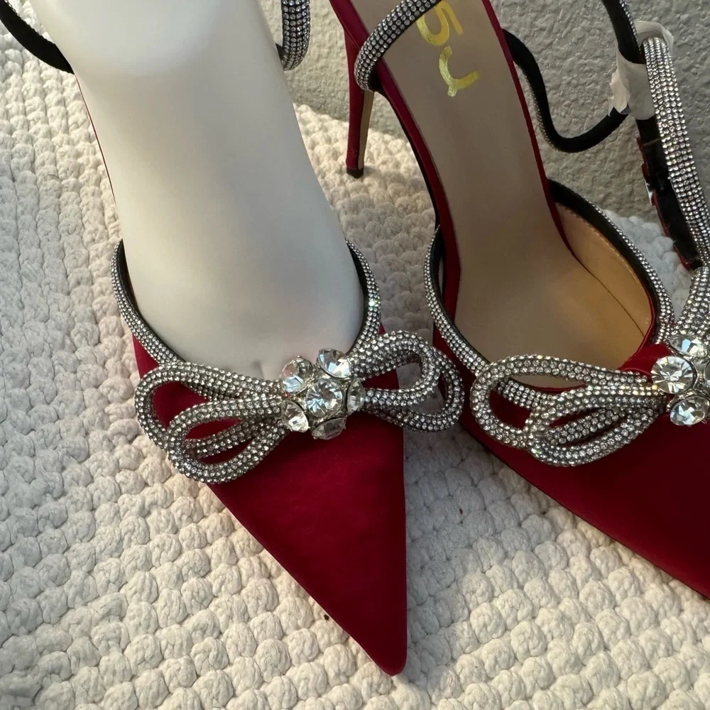 Elegant Red Stiletto Heels with Rhinestone Bow Accents